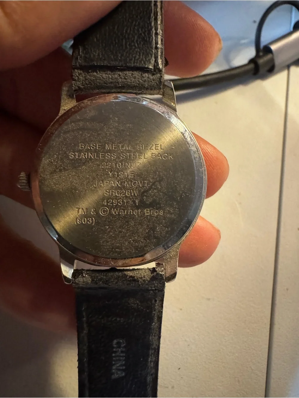 Warner Bros. Silver Case Wristwatch with Black Strap